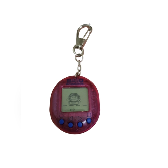 Vintage playmates Nano baby purple clip on keychain virtual toy - Picture 2 of 3